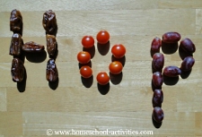 word 'hop' spelt in fruit