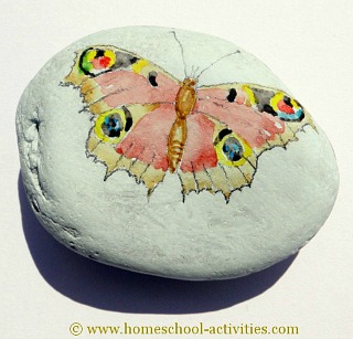 pebble painting with a butterfly