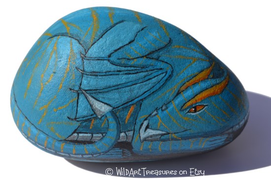hand painted dragon on rock