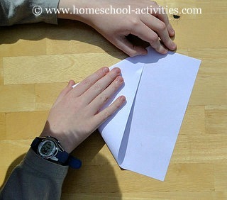how to make paper airplanes step three