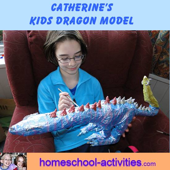 Catherine painting paper mache dragon