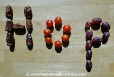 word 'hop' spelt in fruit
