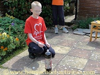 volcano experiment with coke and mentos