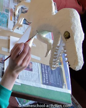 painting Velociraptor model