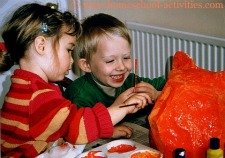 Catherine and William doing paper mache